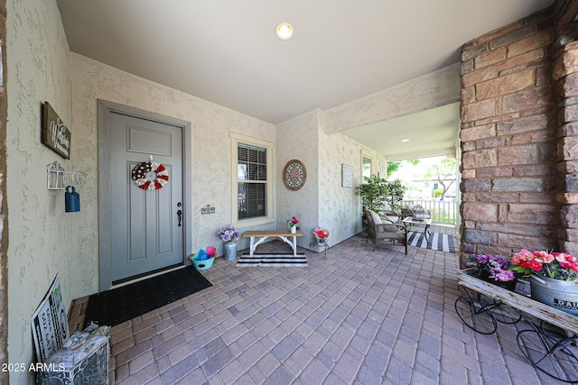 20421 W Legend Trl, Buckeye, AZ 85396 - property entrance with covered porch and stucco siding