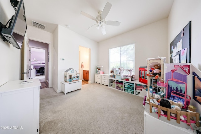 20421 W Legend Trl, Buckeye, AZ 85396 - game room with a ceiling fan and light carpet