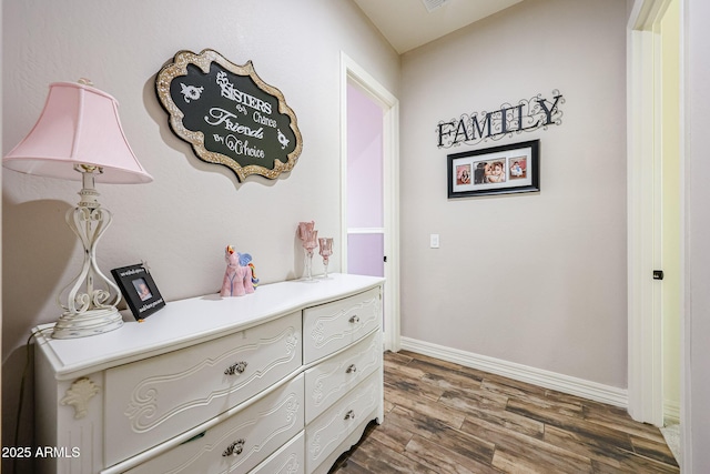 20421 W Legend Trl, Buckeye, AZ 85396 - corridor with wood finished floors and baseboards