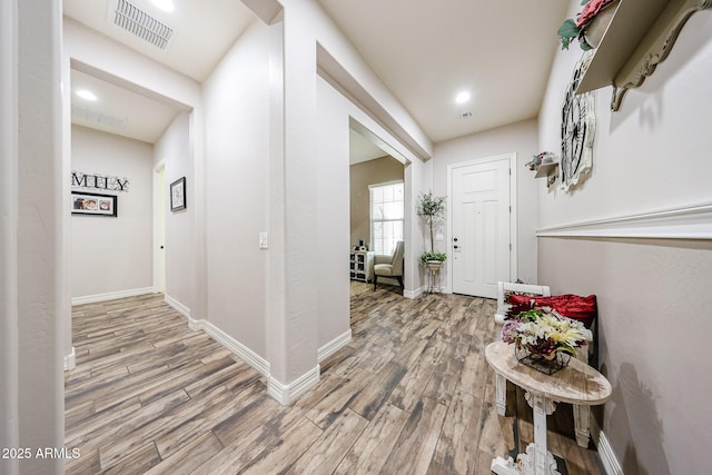 20421 W Legend Trl, Buckeye, AZ 85396 - hall featuring wood finished floors, baseboards, and recessed lighting