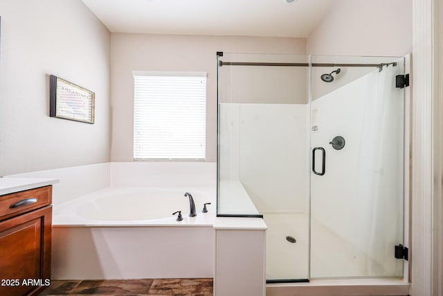 20421 W Legend Trl, Buckeye, AZ 85396 - bathroom featuring a shower stall, a bath, and vanity