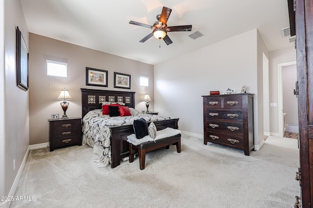20421 W Legend Trl, Buckeye, AZ 85396 - bedroom featuring light colored carpet, baseboards, and a ceiling fan