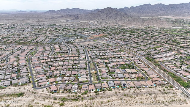 20421 W Legend Trl, Buckeye, AZ 85396 - aerial view of property's location featuring nearby suburban area and a mountain backdrop