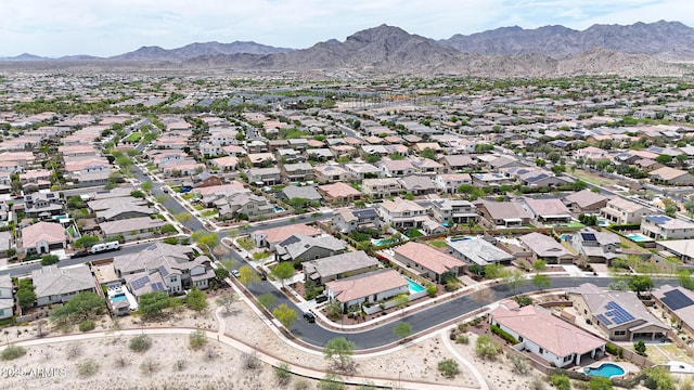 20421 W Legend Trl, Buckeye, AZ 85396 - aerial view of property and surrounding area featuring a mountain backdrop and nearby suburban area