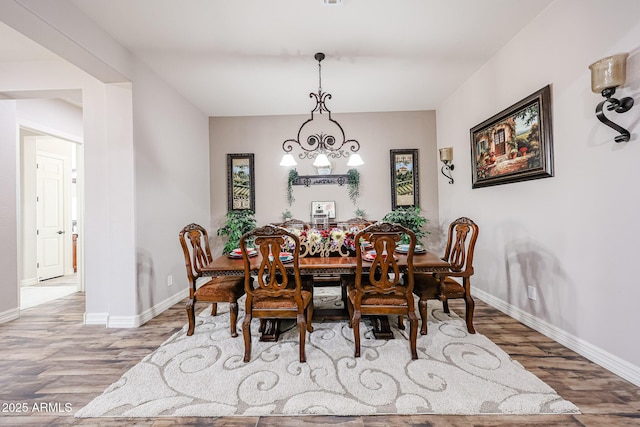 20421 W Legend Trl, Buckeye, AZ 85396 - dining area featuring wood finished floors and baseboards