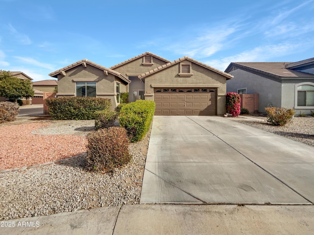 view of front of home with a garage