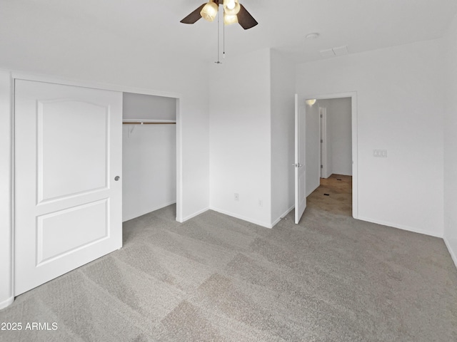 unfurnished bedroom with light carpet, ceiling fan, and a closet