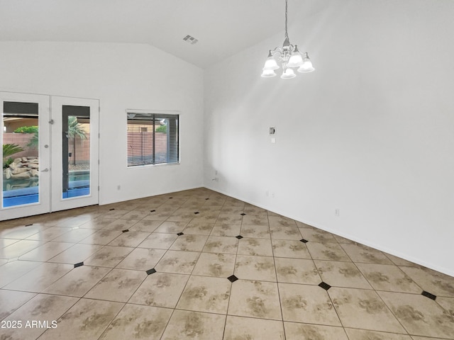 unfurnished dining area featuring french doors, light tile patterned floors, a chandelier, and vaulted ceiling