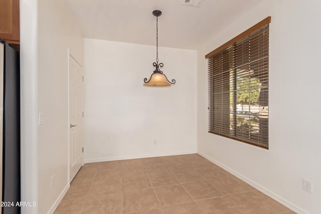 view of tiled empty room