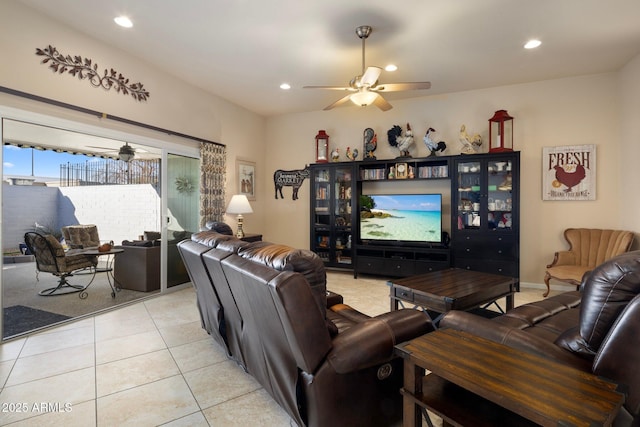 living room featuring ceiling fan and light tile patterned floors