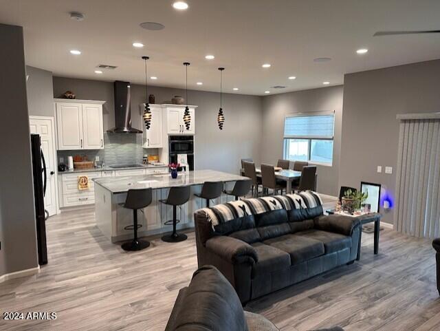 living room featuring light hardwood / wood-style flooring