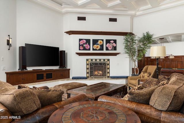 living room featuring crown molding, coffered ceiling, pool table, and a fireplace