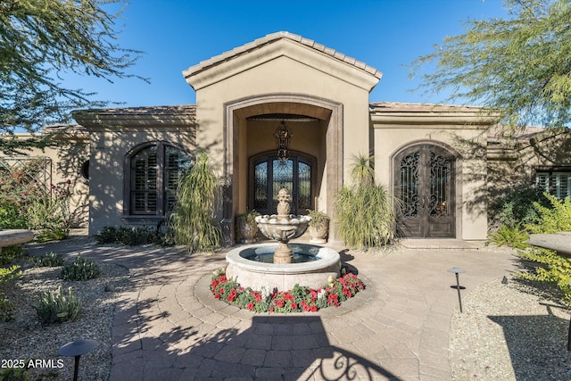 doorway to property with french doors