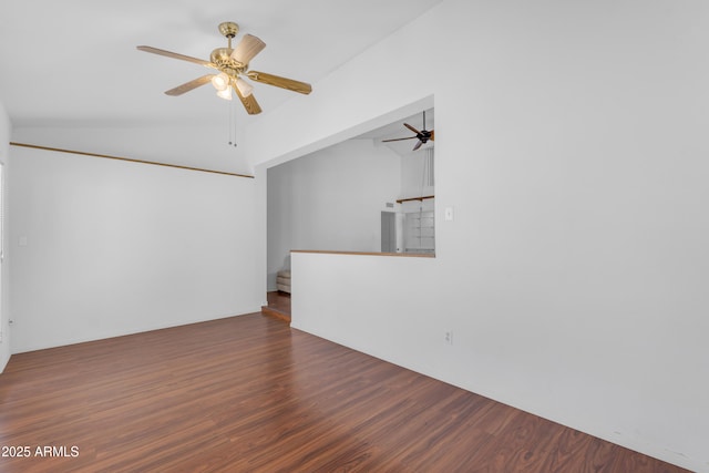 11465 N 56th St, Scottsdale, AZ 85254 - spare room featuring a ceiling fan, wood finished floors, lofted ceiling, and stairs
