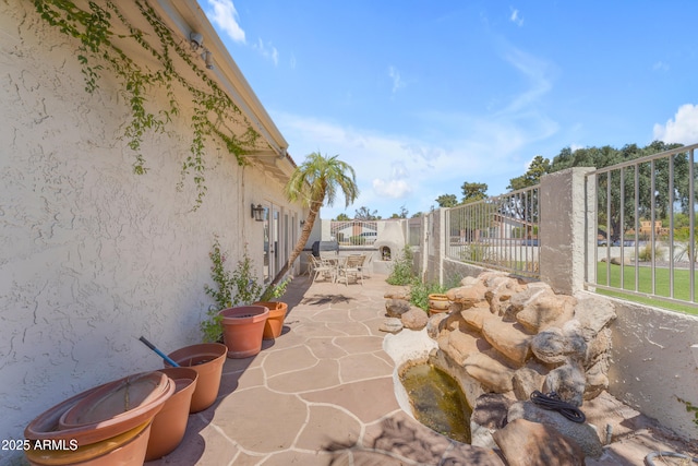 11465 N 56th St, Scottsdale, AZ 85254 - view of patio / terrace featuring outdoor dining area and fence