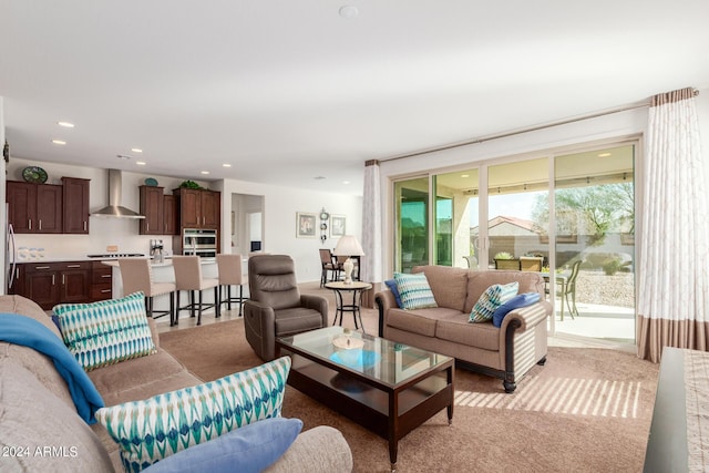 living room with light colored carpet