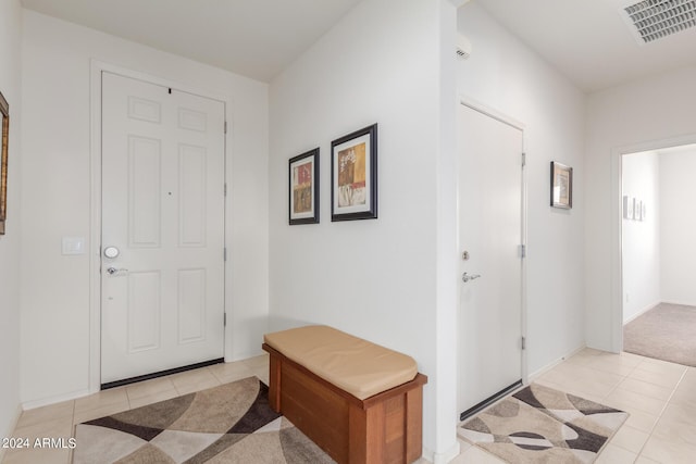 view of tiled foyer entrance