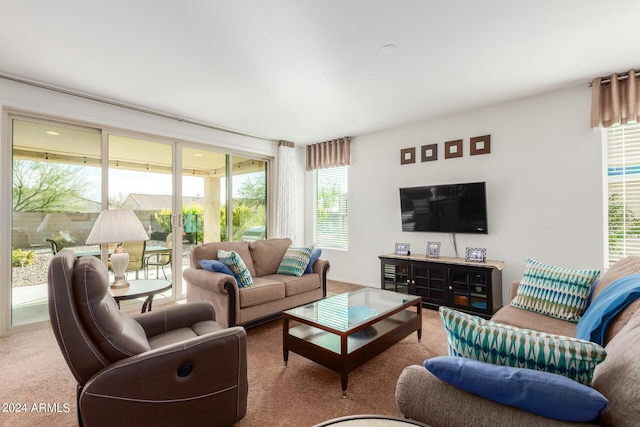 living room with carpet floors and french doors