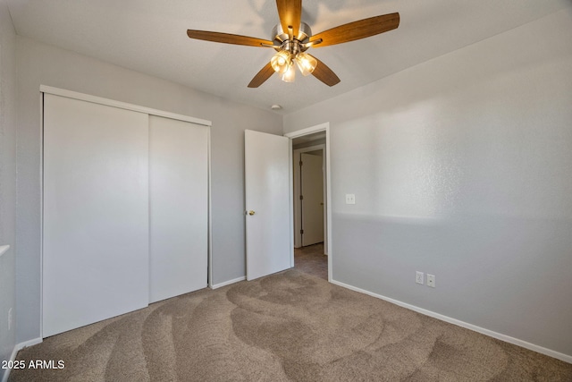 864 S 1st St, Snowflake, AZ 85937 - unfurnished bedroom featuring carpet floors, baseboards, a closet, and ceiling fan