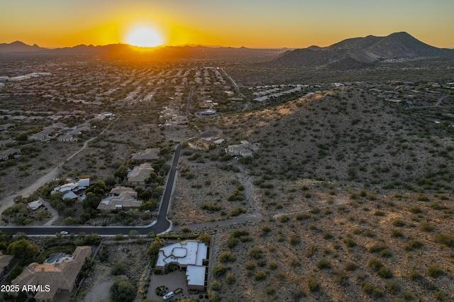 aerial view at dusk with a mountain view