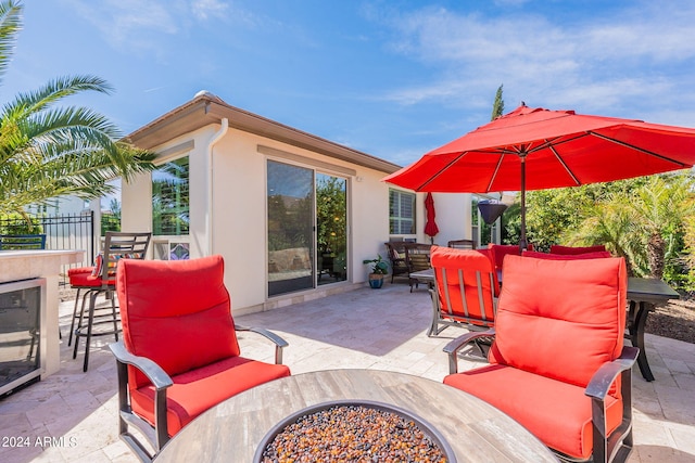 view of patio / terrace featuring an outdoor living space and exterior bar