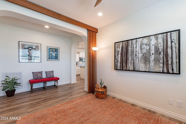 hall featuring wood-type flooring