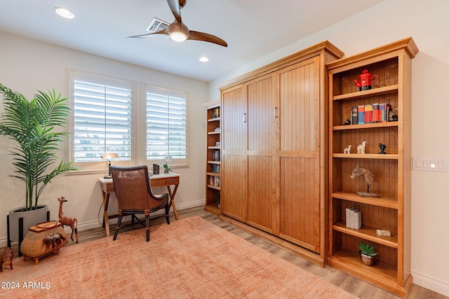 office area with ceiling fan and light wood-type flooring