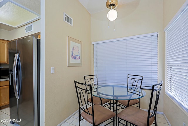 view of tiled dining space