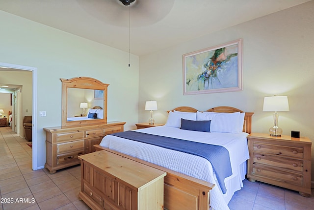 bedroom featuring light tile patterned flooring and ceiling fan