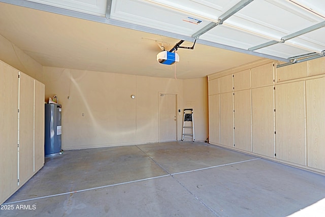 garage featuring water heater and a garage door opener