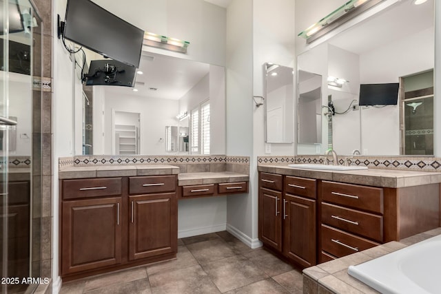4332 S Oregon Ct, Chandler, AZ 85248 - bathroom with a shower stall, two vanities, a tub, tile patterned flooring, and recessed lighting