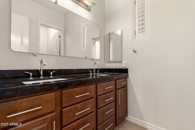 4332 S Oregon Ct, Chandler, AZ 85248 - bathroom with double vanity, tile patterned flooring, and baseboards
