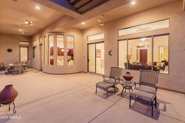 view of patio / terrace featuring ceiling fan