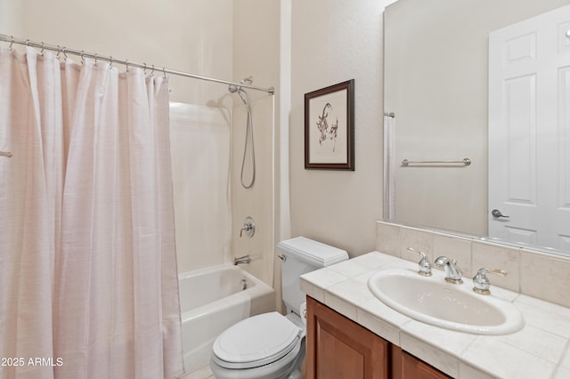 full bathroom with shower / tub combo, vanity, and toilet