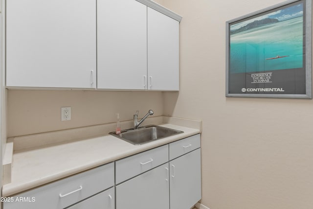 kitchen with white cabinets and sink