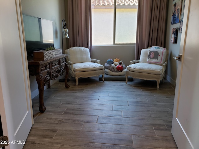 living area featuring dark wood-style flooring