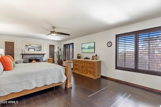 bedroom with dark wood-type flooring and ceiling fan