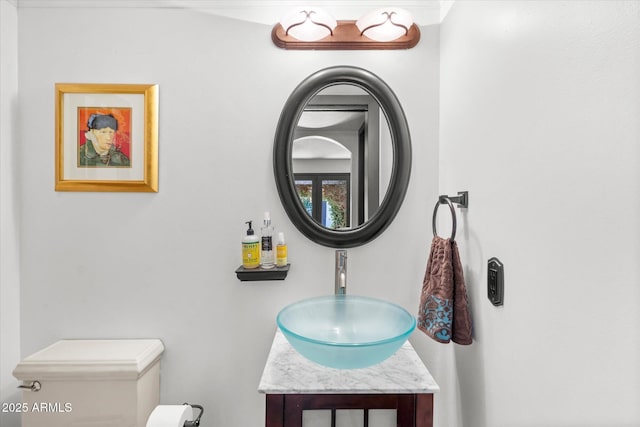 bathroom with vanity and toilet