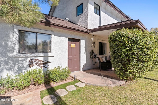 exterior space featuring a patio and a yard