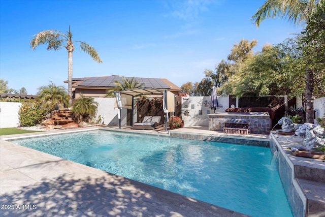 view of swimming pool featuring pool water feature