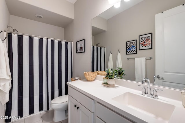 9723 W Patrick Ln, Peoria, AZ 85383 - full bathroom featuring vanity, toilet, tile patterned floors, and curtained shower
