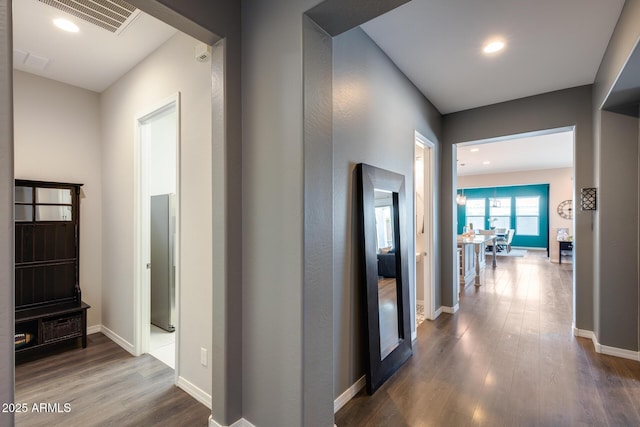 9723 W Patrick Ln, Peoria, AZ 85383 - hallway with dark wood-type flooring, baseboards, and recessed lighting