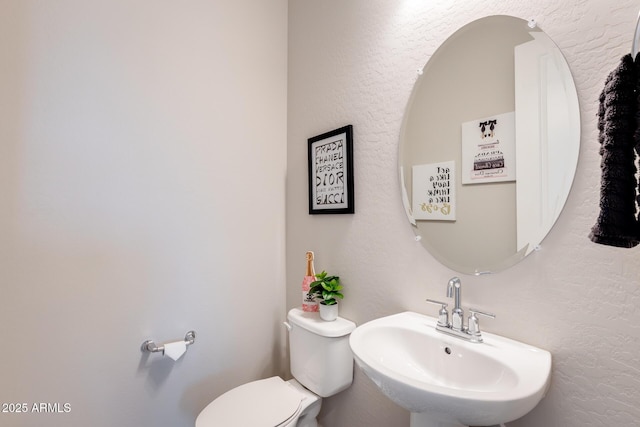 9723 W Patrick Ln, Peoria, AZ 85383 - bathroom featuring a sink and toilet