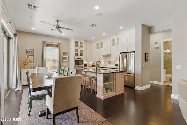 7122 W Ivanhoe St, Chandler, AZ 85226 - dining space with ceiling fan, dark wood-style floors, recessed lighting, and baseboards