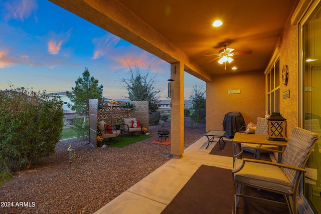 view of patio featuring fence and an outdoor fire pit