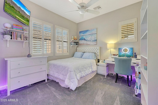 bedroom featuring ceiling fan and dark colored carpet