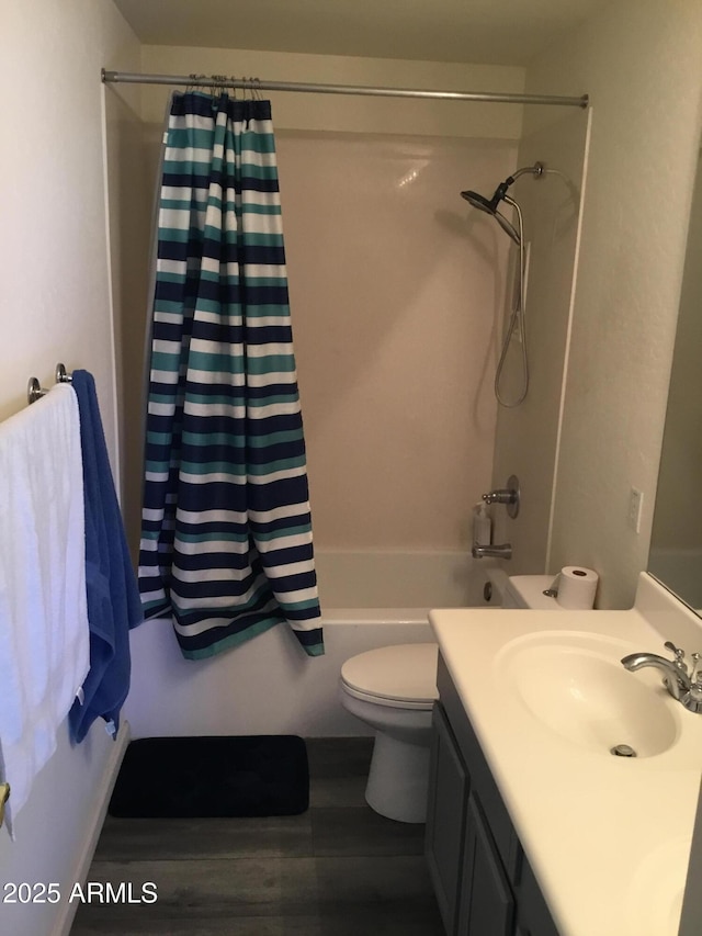 10489 S 182nd Dr, Goodyear, AZ 85338 - bathroom with shower / bath combo with shower curtain, vanity, toilet, and wood finished floors