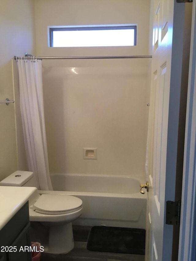10489 S 182nd Dr, Goodyear, AZ 85338 - bathroom featuring toilet, shower / bathtub combination with curtain, and vanity