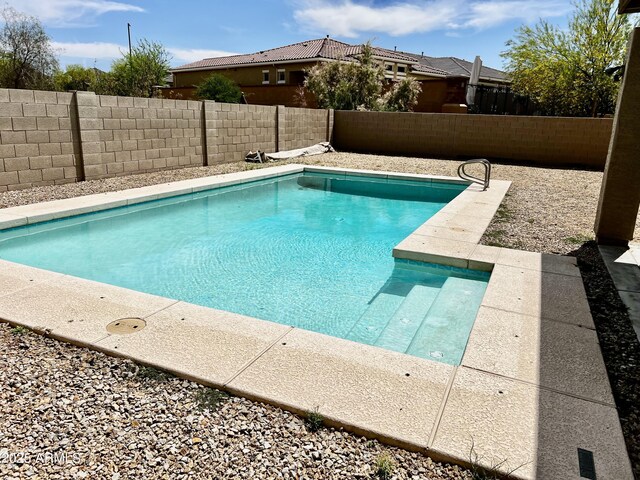 10489 S 182nd Dr, Goodyear, AZ 85338 - view of swimming pool with a fenced backyard and a fenced in pool