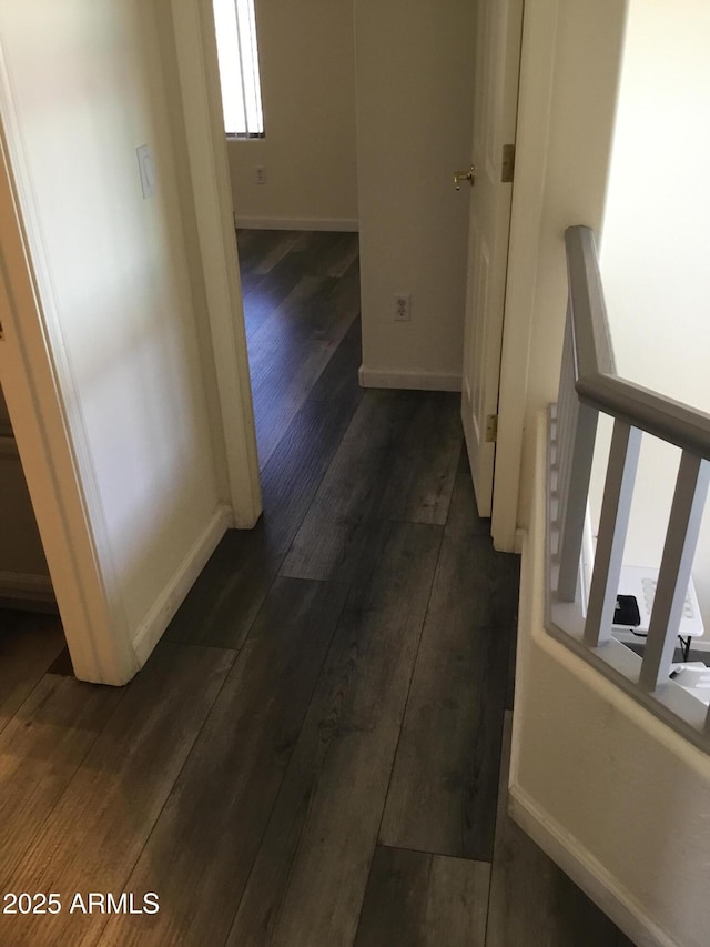 10489 S 182nd Dr, Goodyear, AZ 85338 - corridor with dark wood-type flooring and baseboards